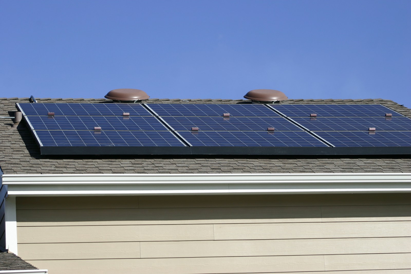 Homeowner reviewing rooftop solar plans